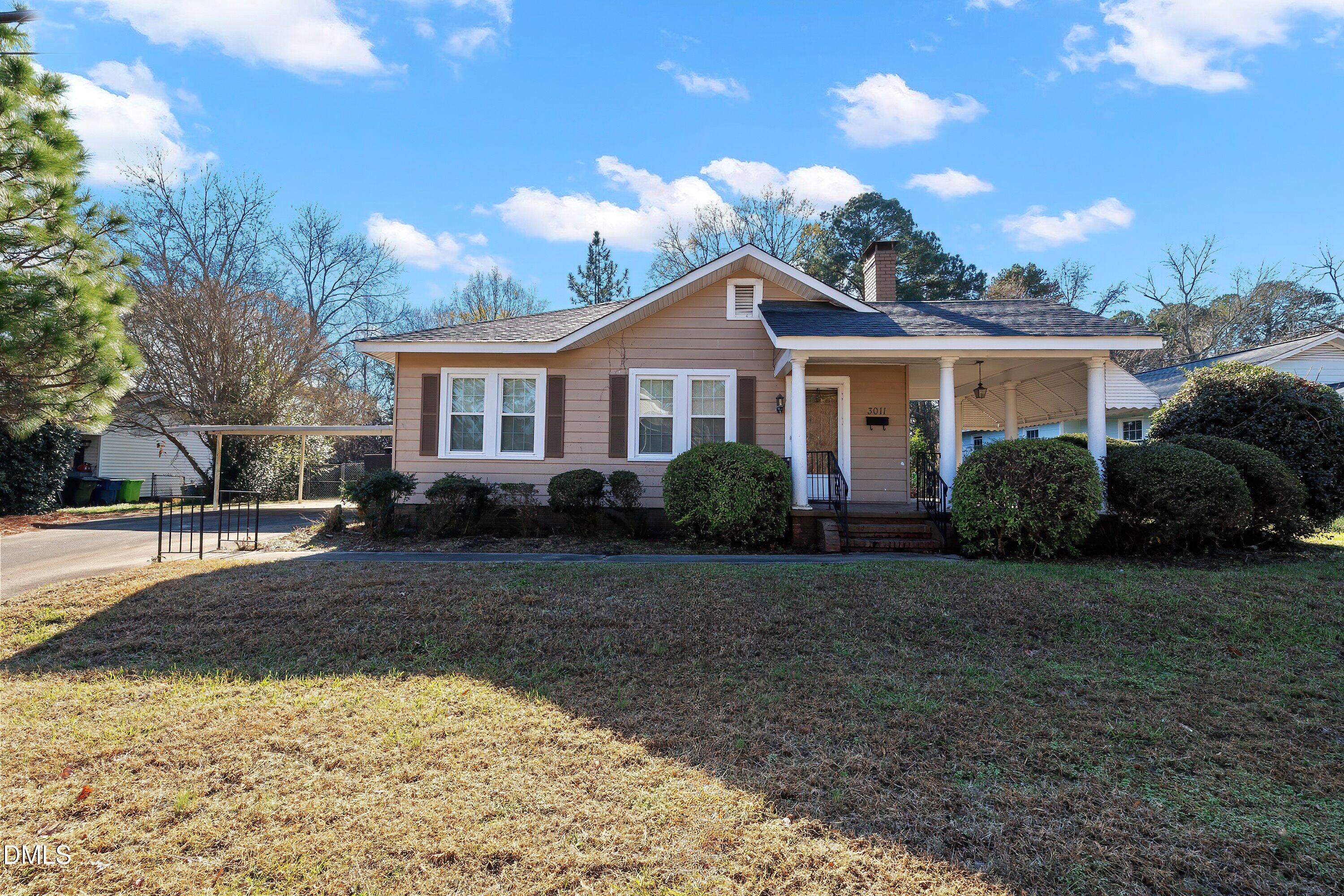3010 Burrell Place Raleigh, NC 27607 - Photo 10 of 46 a view of a house with a yard