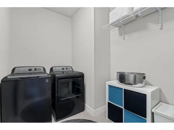 a bathroom with a sink a toilet a shower and a mirror