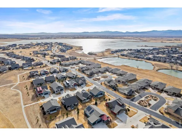 an aerial view of city and ocean view