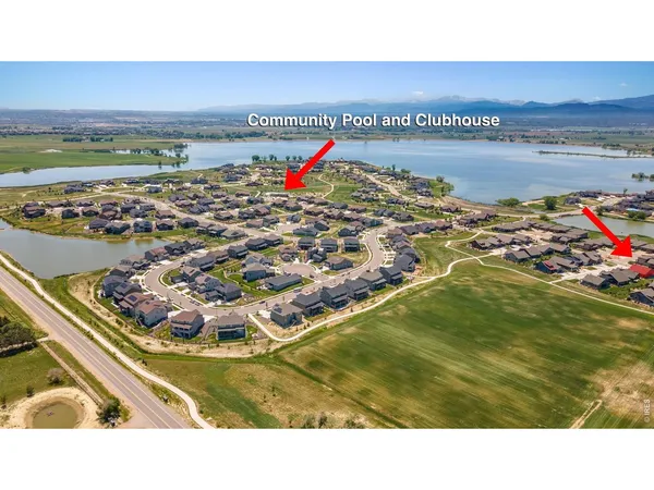 an aerial view of residential building with ocean view