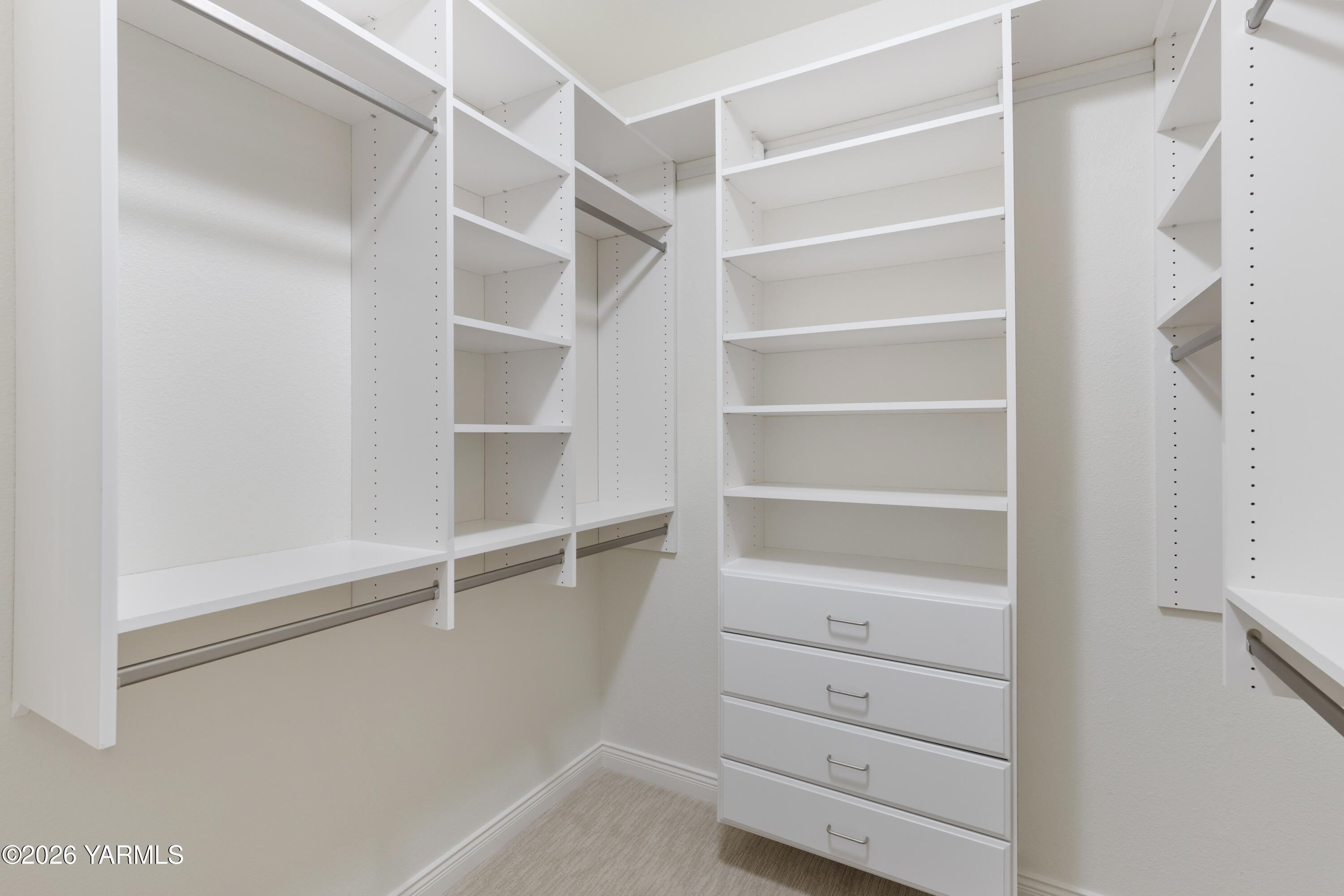 200 Bridle Way, Unit 157 Yakima, WA 98901 - Photo 18 of 30 a view of walk in closet with empty racks