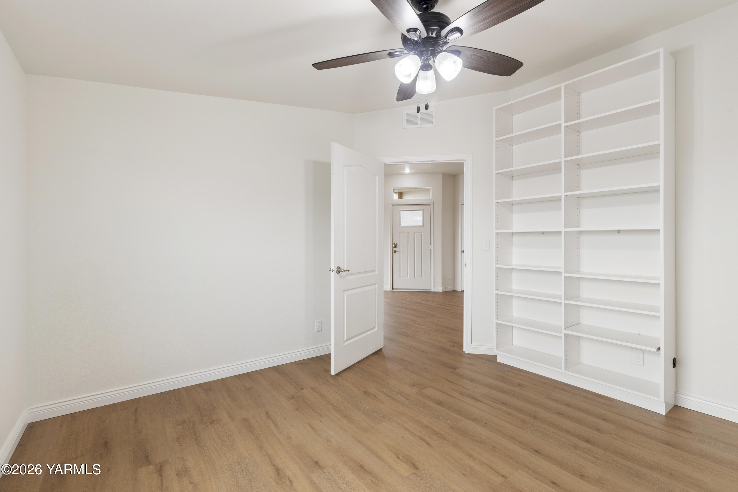 200 Bridle Way, Unit 157 Yakima, WA 98901 - Photo 20 of 30 an empty room with wooden floor closet and windows