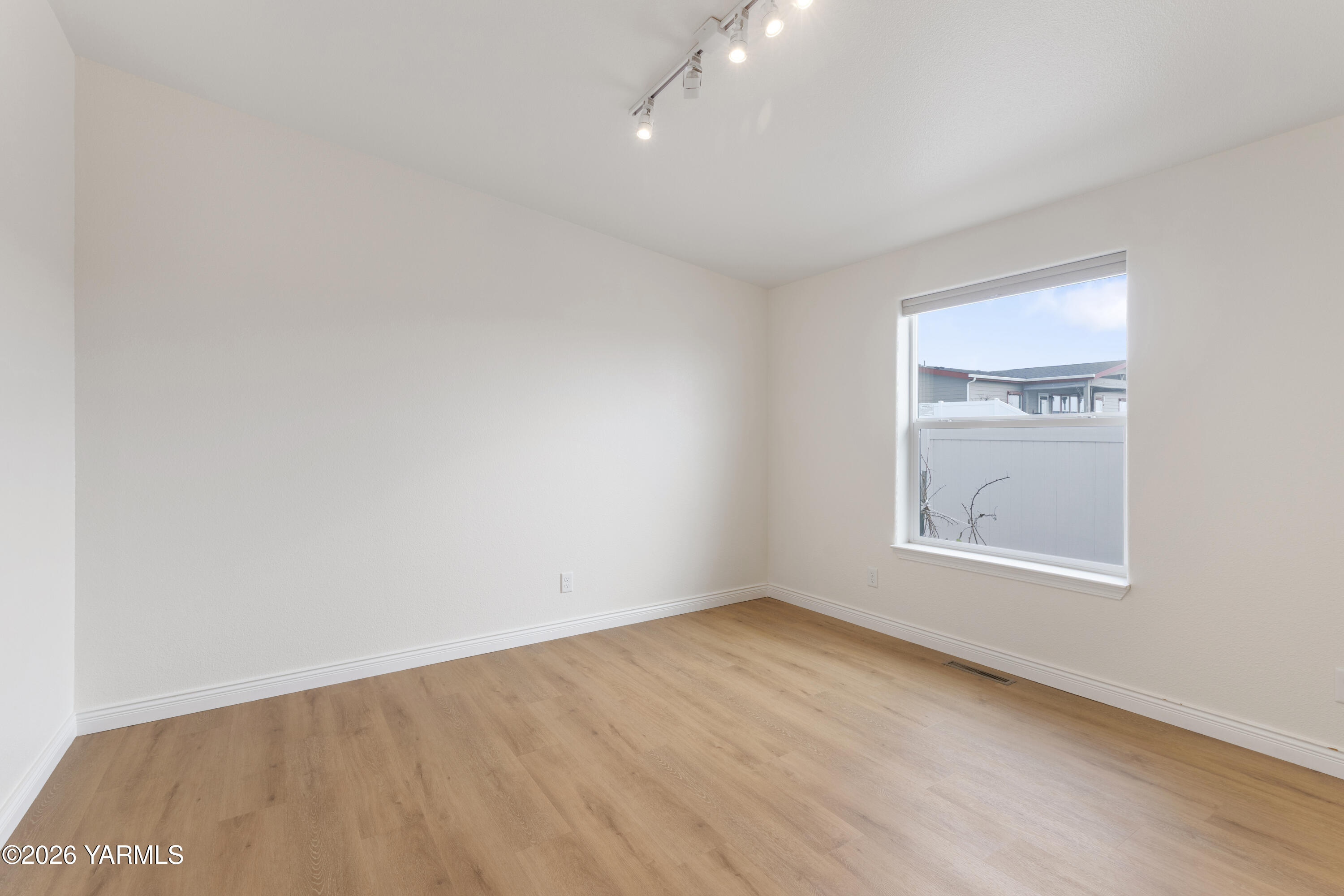 200 Bridle Way, Unit 157 Yakima, WA 98901 - Photo 22 of 30 an empty room with a window