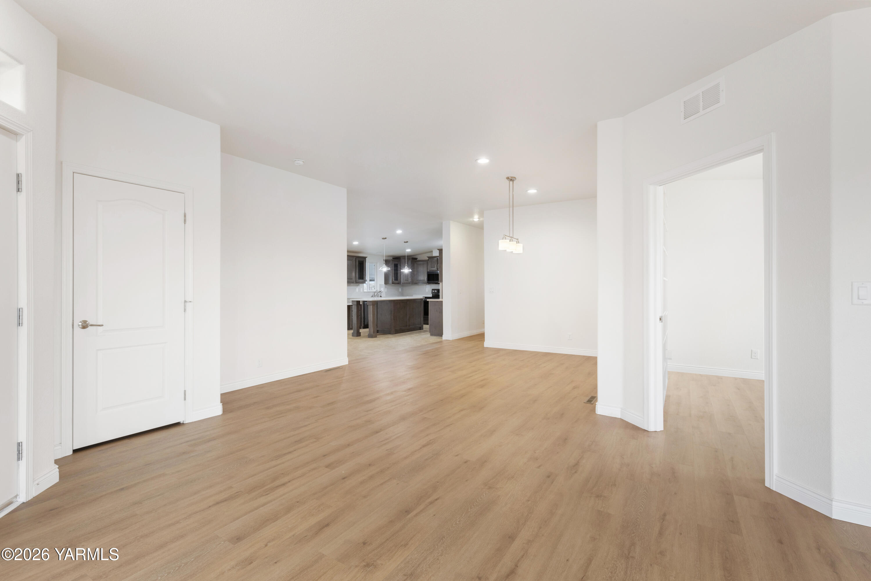 200 Bridle Way, Unit 157 Yakima, WA 98901 - Photo 8 of 30 a view of empty room with wooden floor