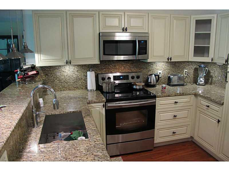 9005 Flynn Circle, Unit 2 Boca Raton, FL 33496 - Photo 3 of 9 Exterior Front