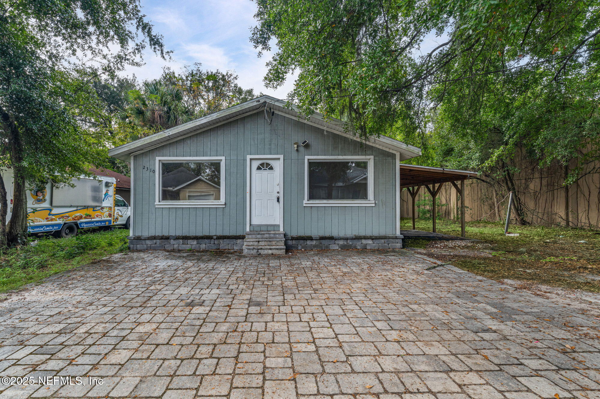 2310 Jerusalem Street Jacksonville, FL 32207 - Photo 1 of 39 a view of a house with a yard