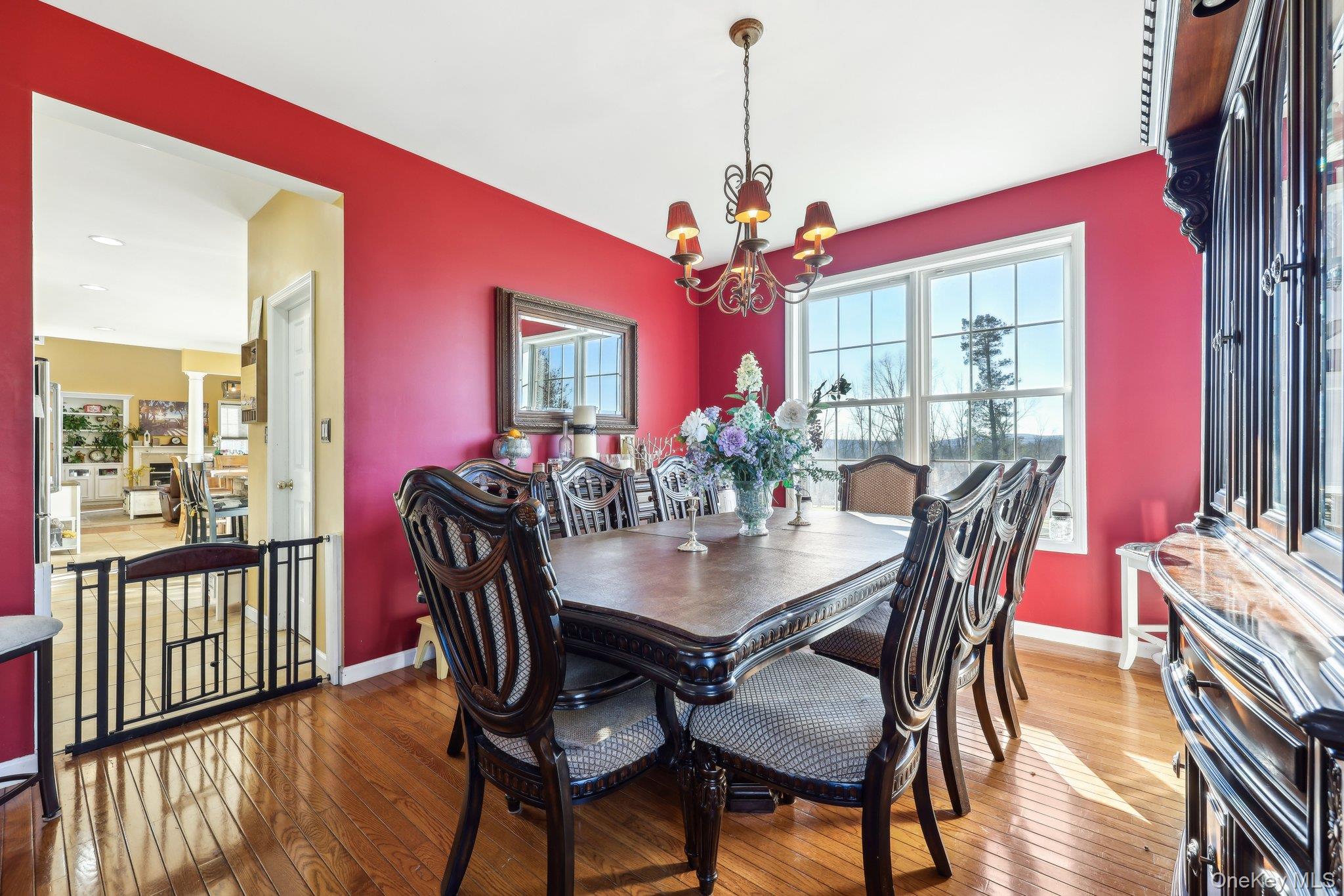 13 Mansion Ridge Boulevard Monroe, NY 10950 - Photo 11 of 49 a view of a dining room with furniture window and wooden floor