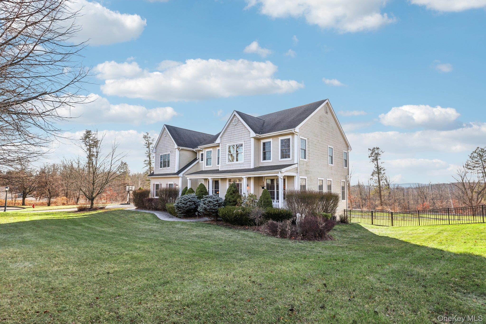 13 Mansion Ridge Boulevard Monroe, NY 10950 - Photo 2 of 49 a view of a house with a big yard and a large tree