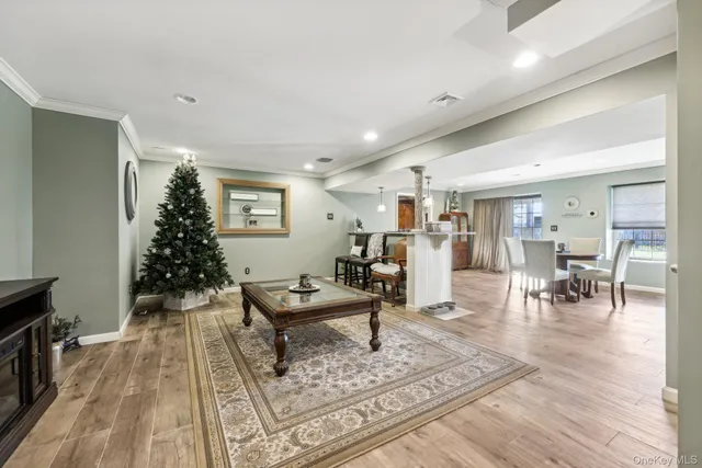 a living room with furniture and a rug