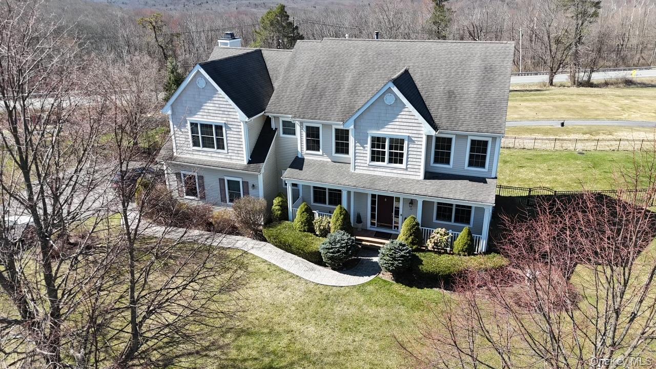 13 Mansion Ridge Boulevard Monroe, NY 10950 - Photo 45 of 49 a view of house with yard and outdoor seating