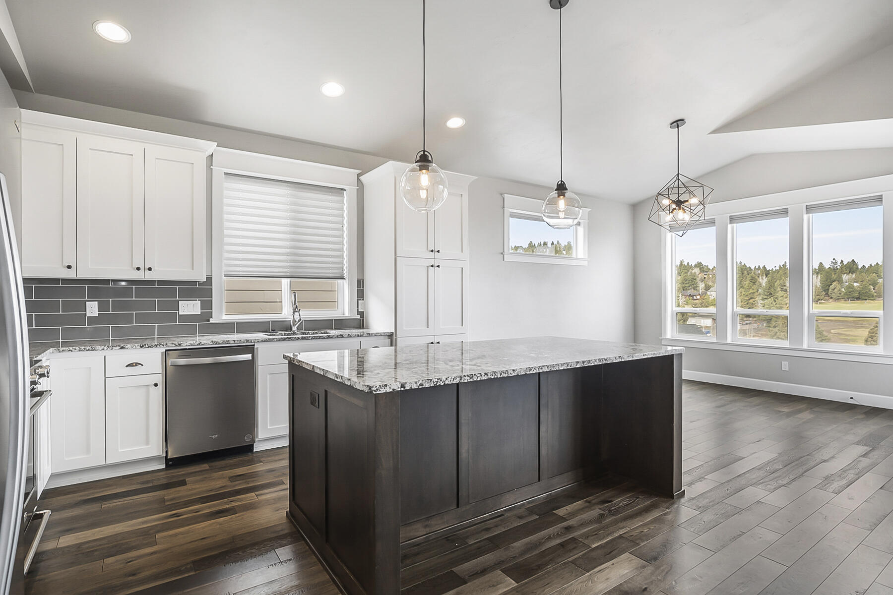 2612 Northwest Compass Corner Loop Bend, OR 97703 - Photo 15 of 44 room to move with the Granite Island and stainless appliances