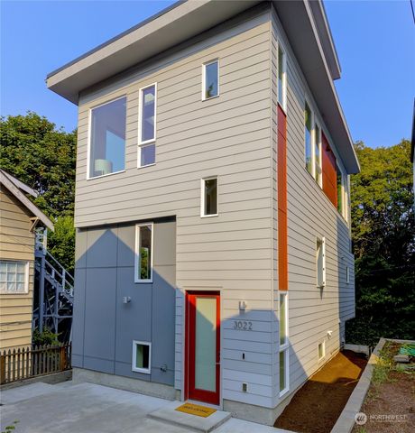 a view of house with wooden fence