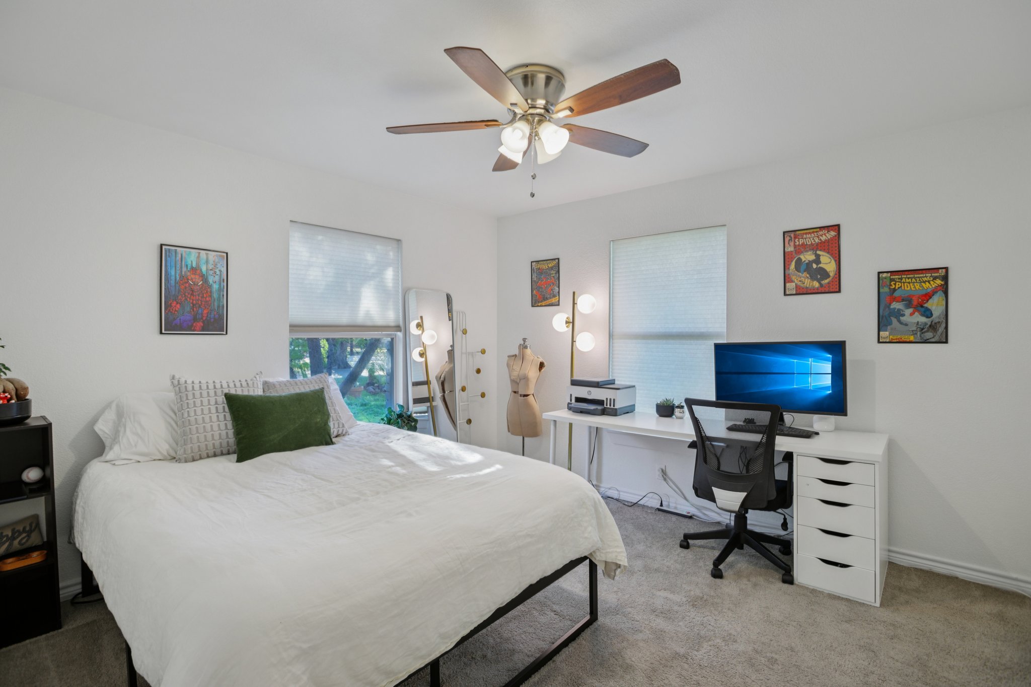 4413 Russell Drive Austin, TX 78704 - Photo 19 of 22 Bedroom with light carpet, a ceiling fan, and an office area