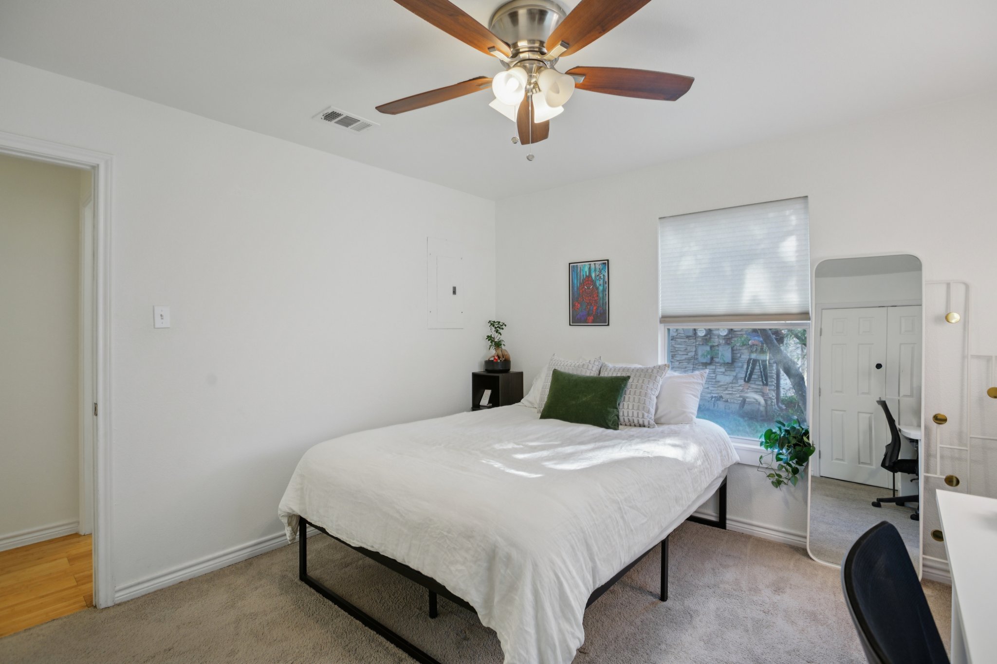 4413 Russell Drive Austin, TX 78704 - Photo 20 of 22 Bedroom with light carpet and ceiling fan