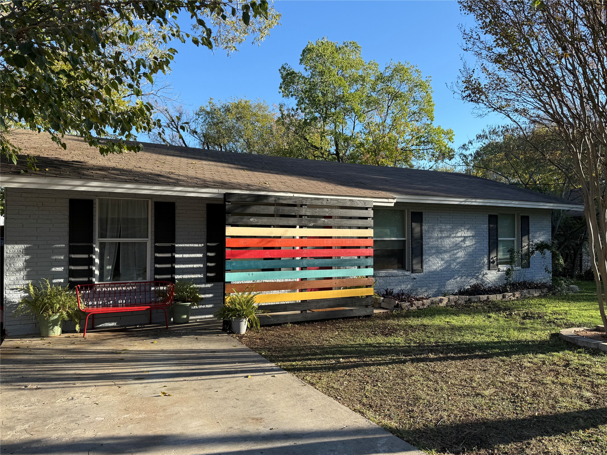 4413 Russell Drive Austin, TX 78704 - Photo 2 of 22 View of front of home with brick siding and covered porch