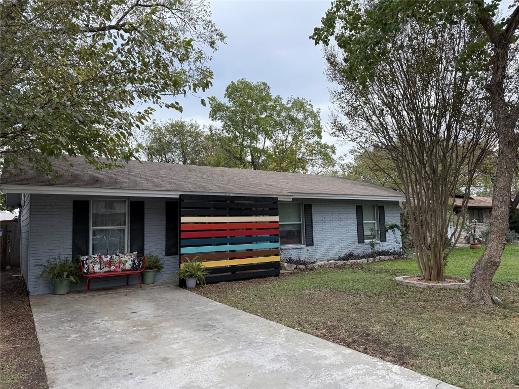 4413 Russell Drive Austin, TX 78704 - Photo 29 of 29 a house view with a backyard space