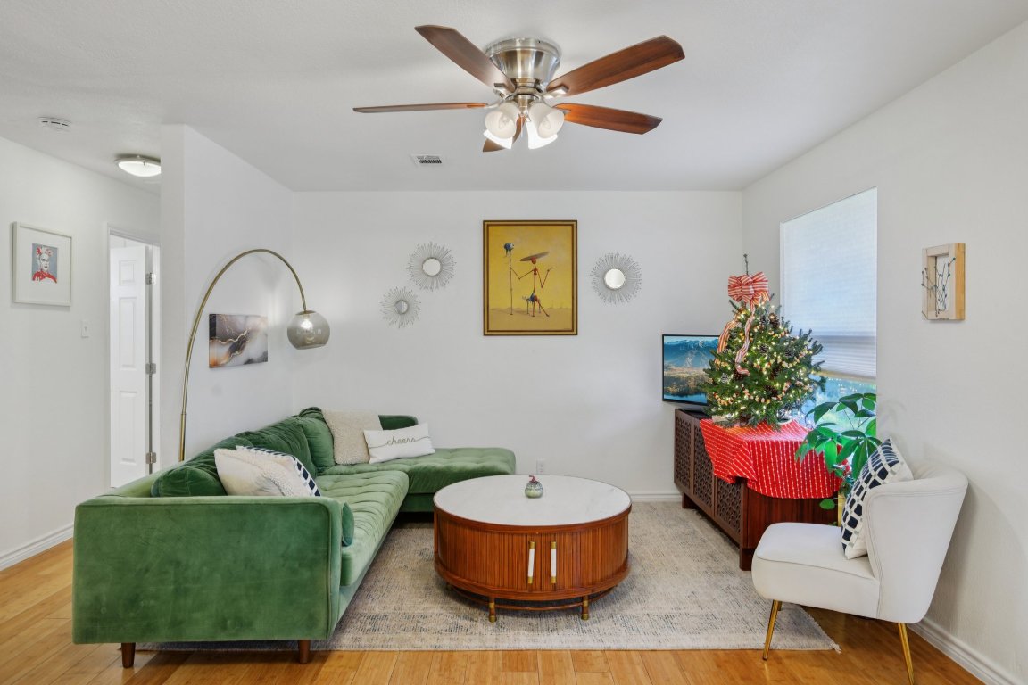 4413 Russell Drive Austin, TX 78704 - Photo 3 of 29 a living room with furniture and a dining room