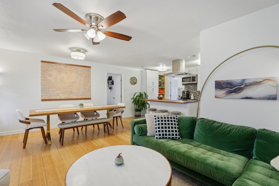 4413 Russell Drive Austin, TX 78704 - Photo 5 of 29 a living room with furniture and wooden floor