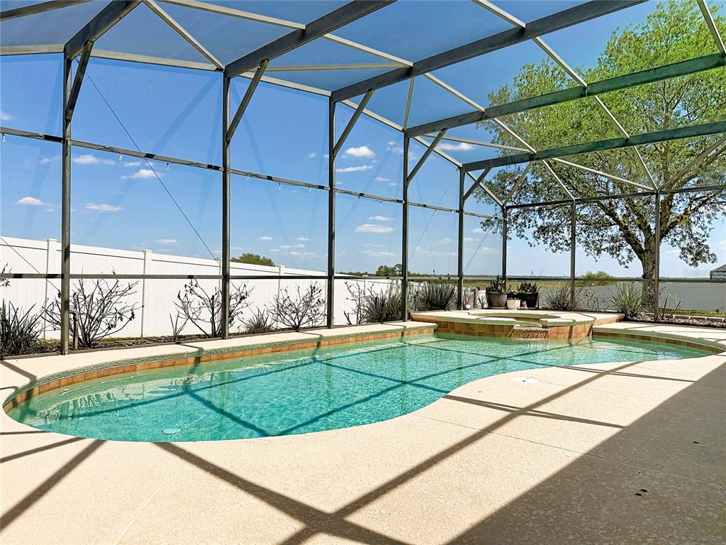 135 Blackstone Creek Road Groveland, FL 34736 - Photo 5 of 62 a view of a backyard