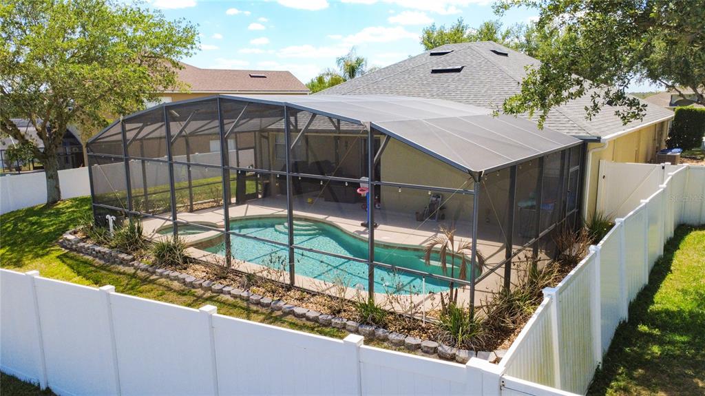 135 Blackstone Creek Road Groveland, FL 34736 - Photo 56 of 62 a view of a backyard