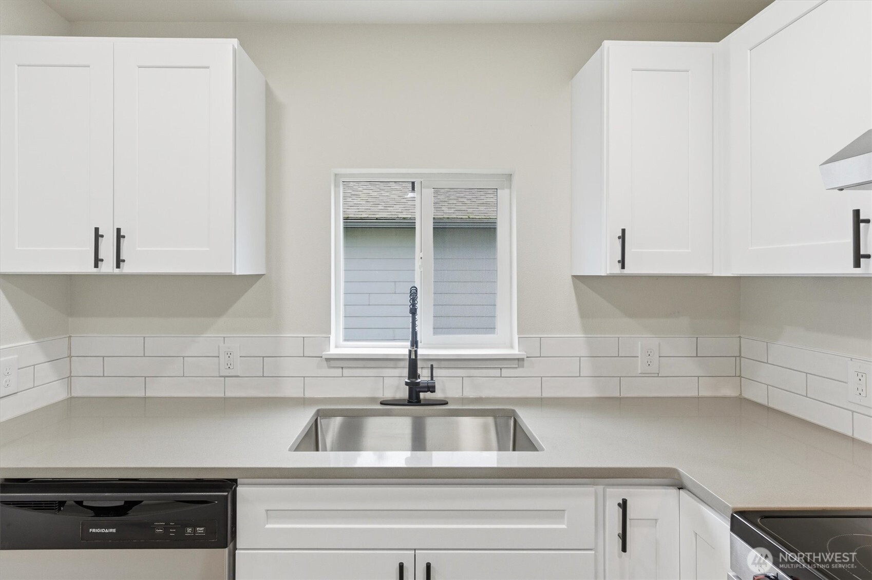 289 20th Avenue Longview, WA 98632 - Photo 11 of 38 a kitchen with sink and cabinets