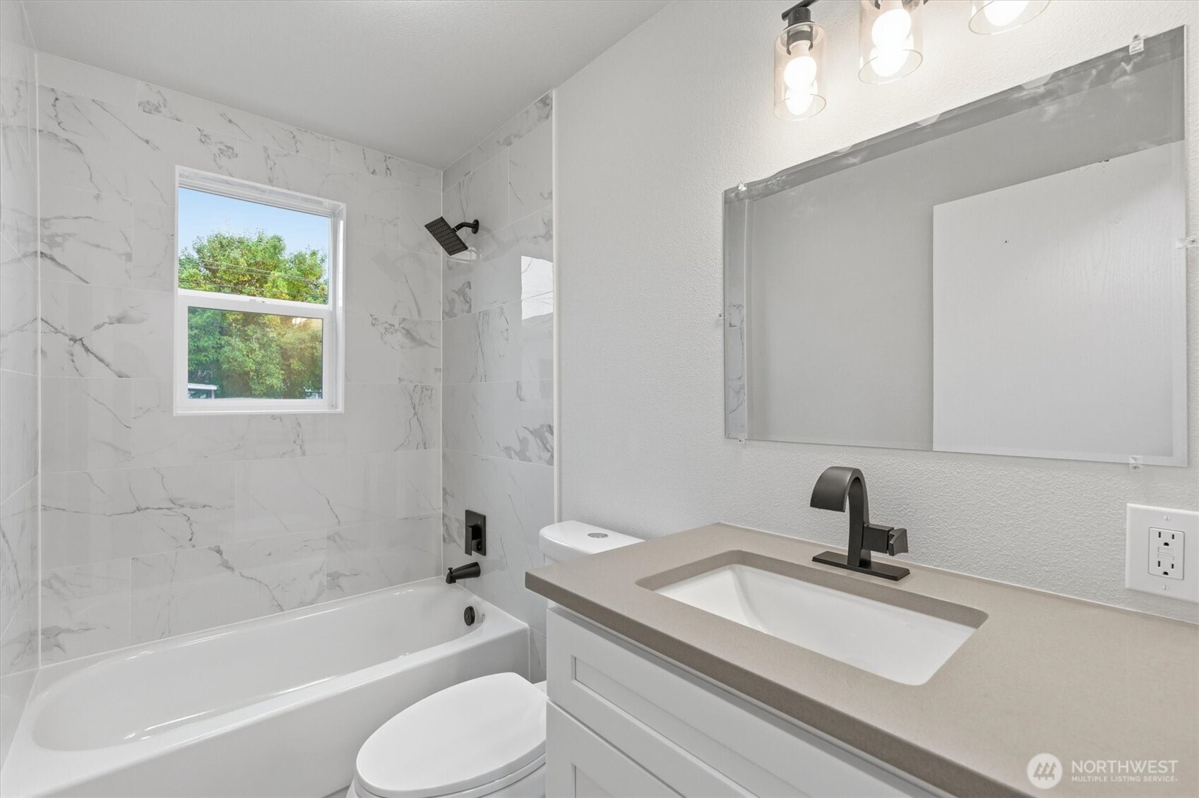 289 20th Avenue Longview, WA 98632 - Photo 25 of 38 a bathroom with a sink toilet a bathtub and a shower