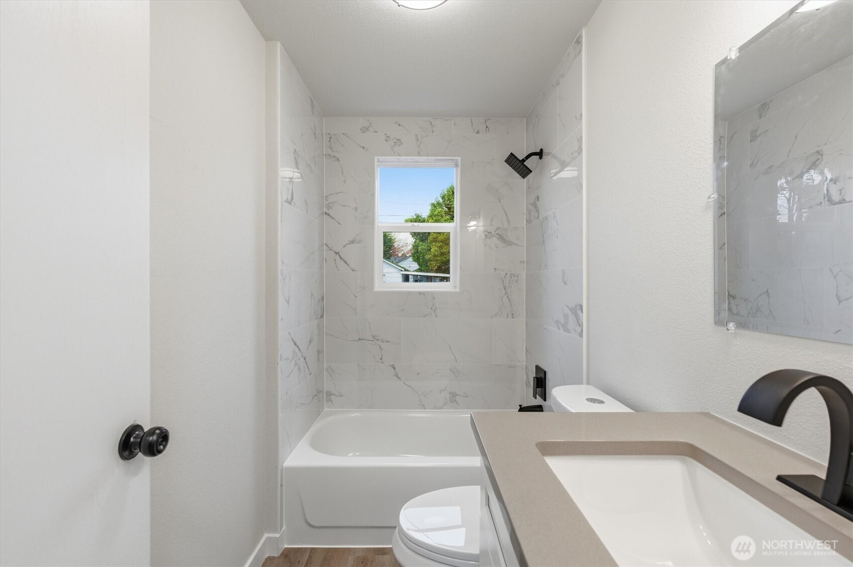 289 20th Avenue Longview, WA 98632 - Photo 26 of 38 a bathroom with a sink toilet and shower