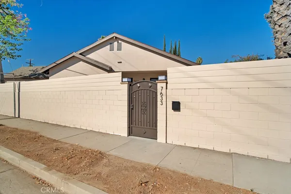 a front view of a house with a garage