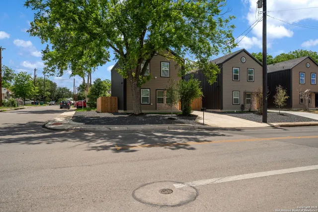 front view of a house with a street