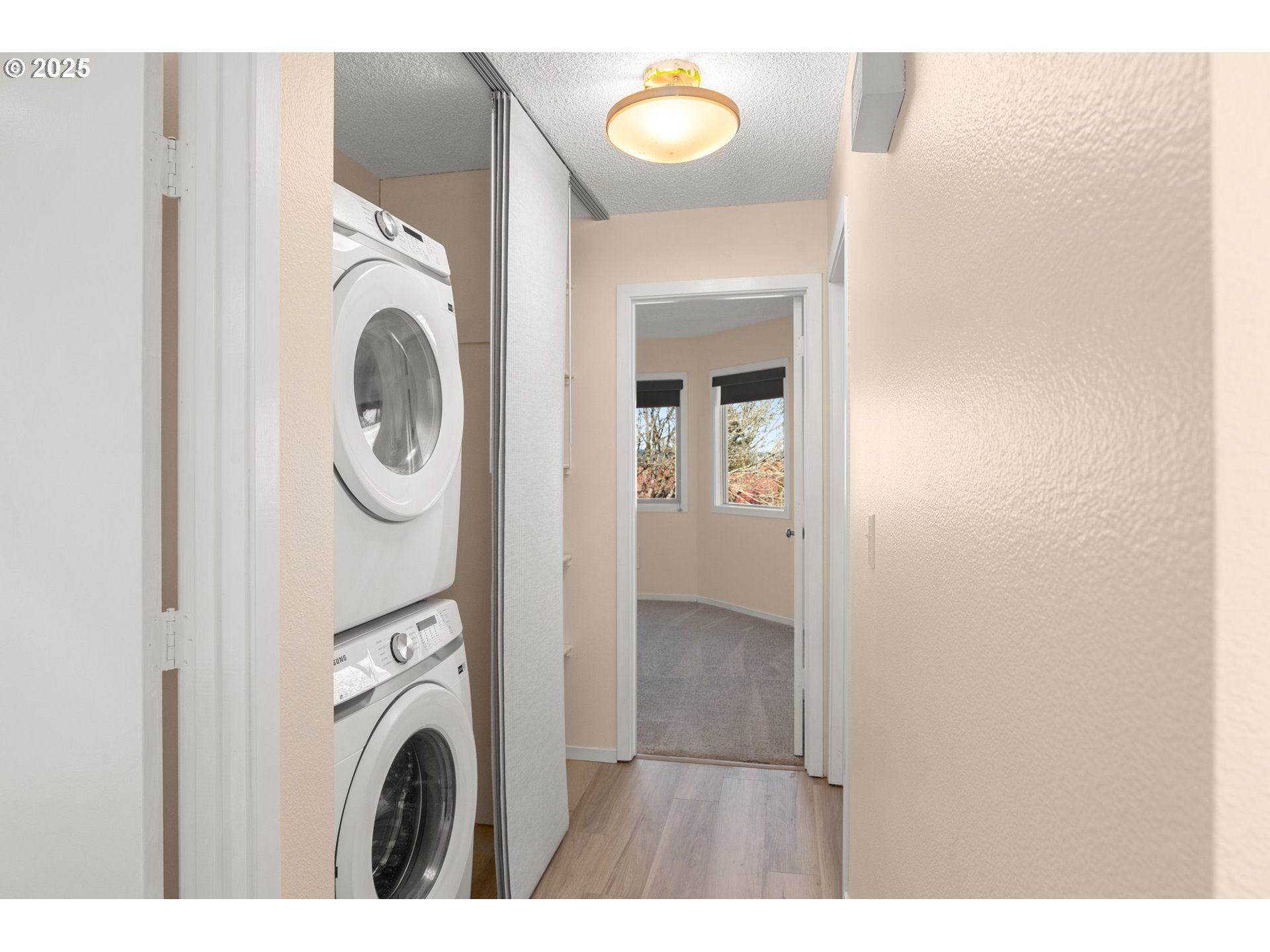 124 Oswego Summit Lake Oswego, OR 97035 - Photo 11 of 23 a view of washer and dryer in a utility room