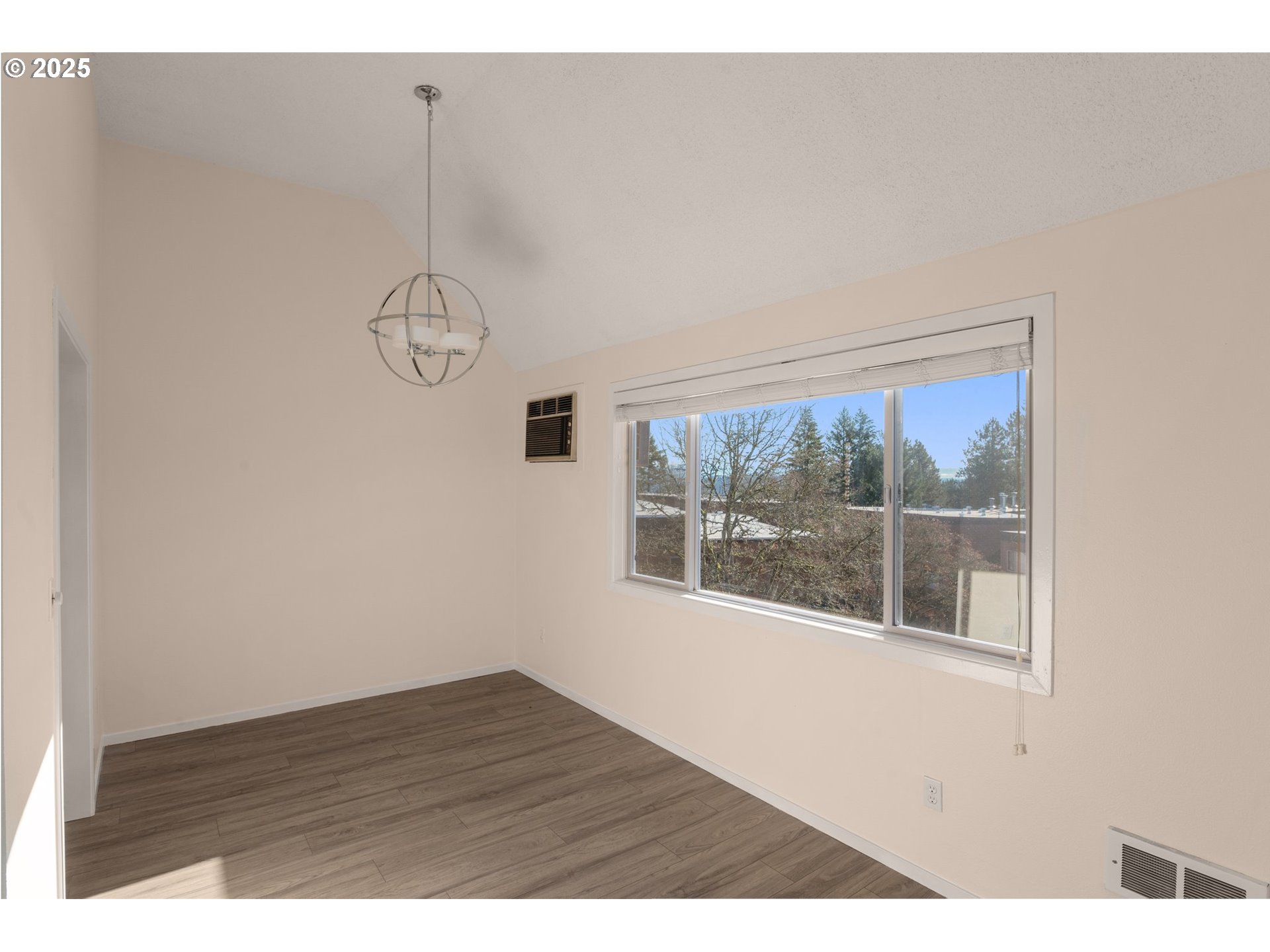 124 Oswego Summit Lake Oswego, OR 97035 - Photo 8 of 23 a view of empty room with wooden floor and fan