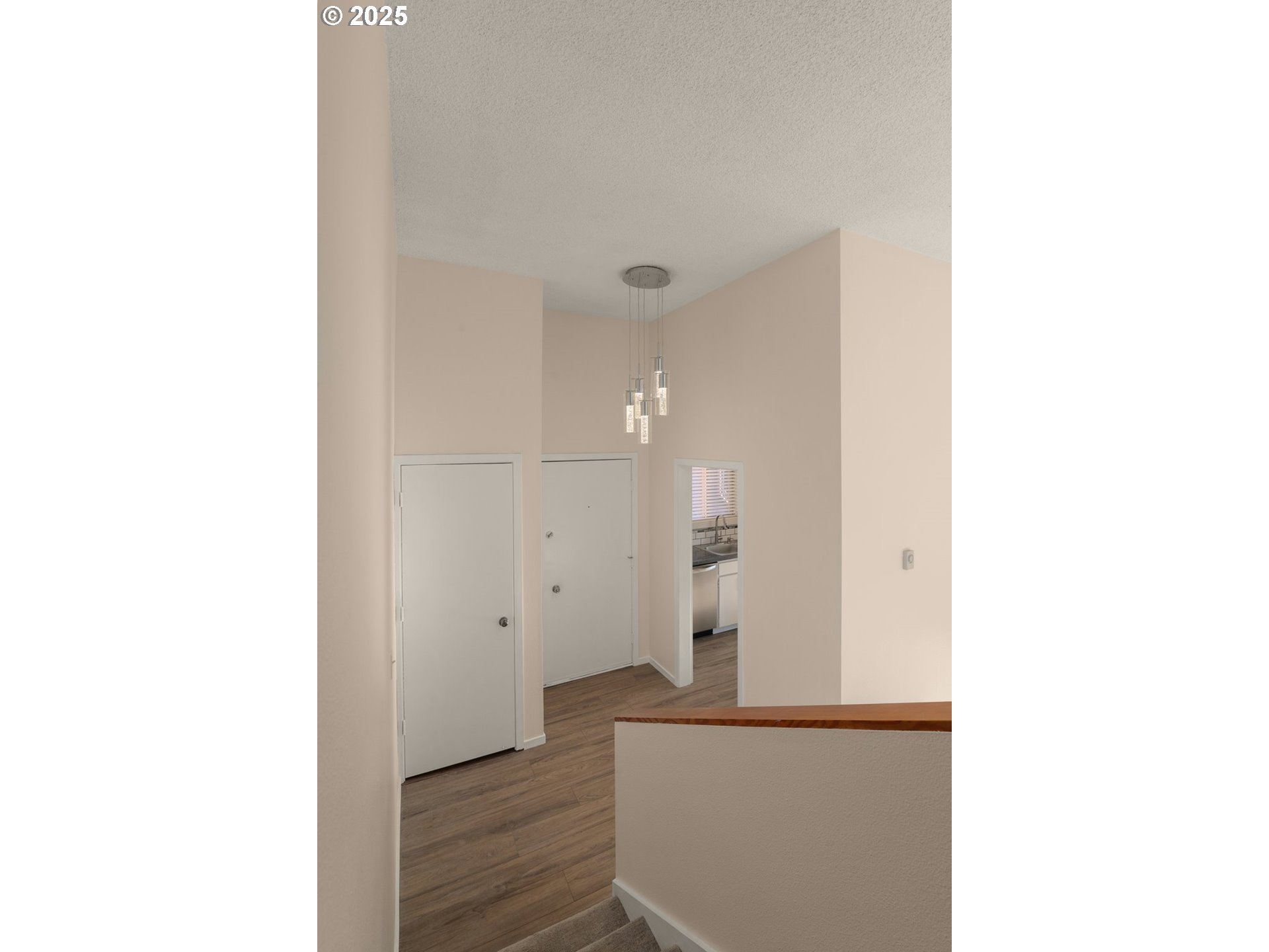 124 Oswego Summit Lake Oswego, OR 97035 - Photo 10 of 23 a view of a hallway with wooden floor