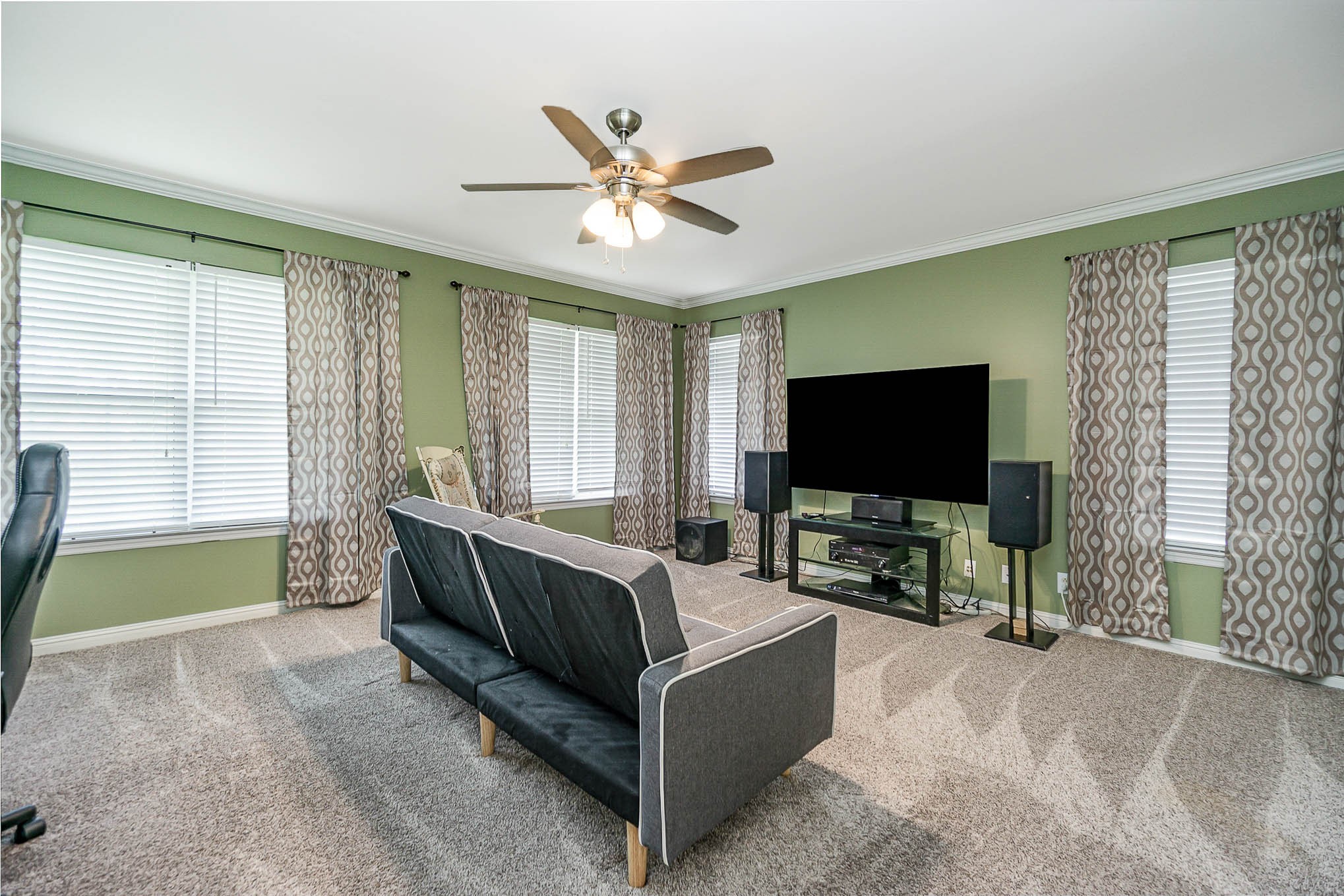 1990 Portway Road Spring Hill, TN 37174 - Photo 16 of 19 a living room with furniture and a flat screen tv