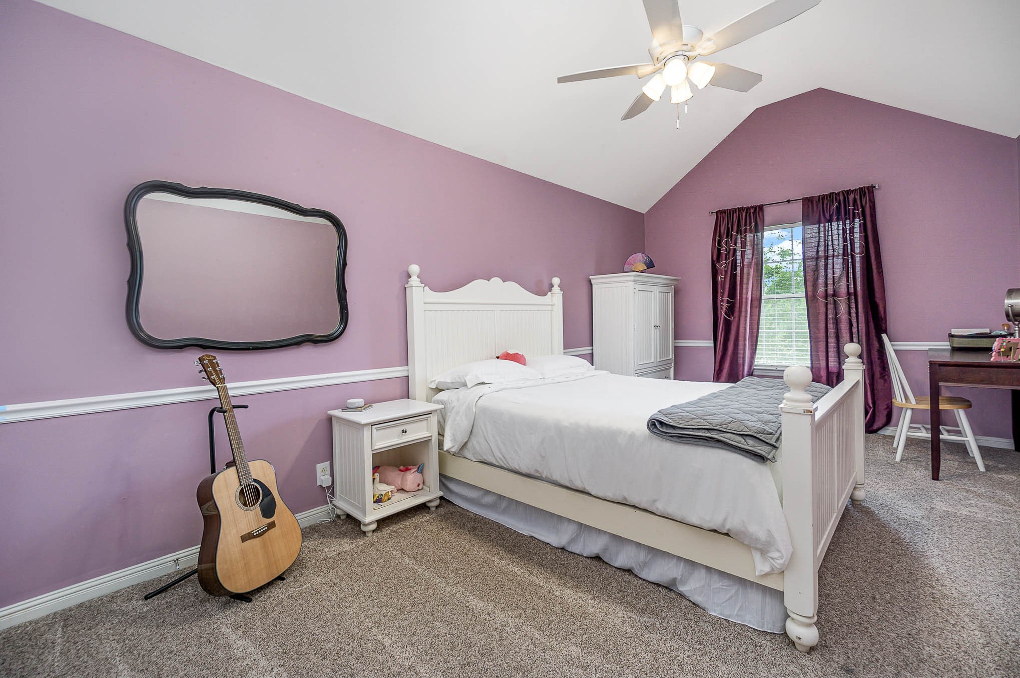 1990 Portway Road Spring Hill, TN 37174 - Photo 17 of 19 a bedroom with a bed and a chandelier