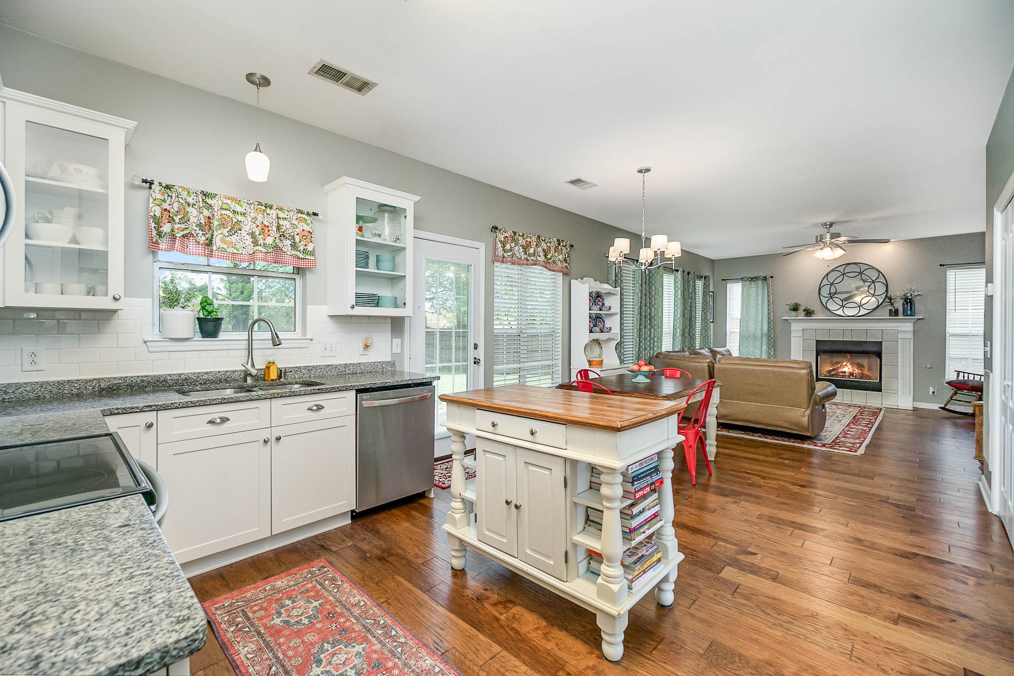 1990 Portway Road Spring Hill, TN 37174 - Photo 6 of 19 a open kitchen with stainless steel appliances granite countertop a stove and cabinets