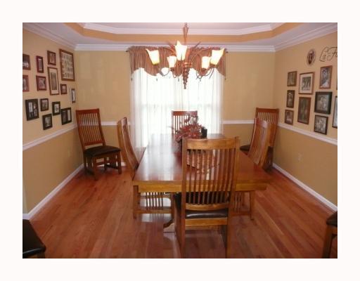 205 Meadow Ridge Court McKees Rocks, PA 15136 - Photo 3 of 13 Dining Room. Gleaming Harwood floors! Please notice the trey ceiling! And by the way the gorgeous chandelier stays!