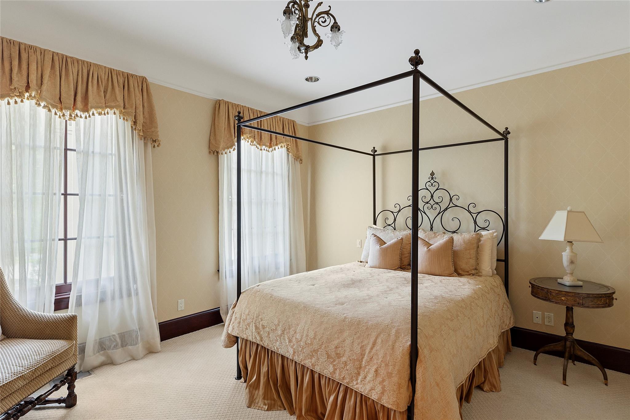 5 Half Moon Lane Sands Point, NY 11050 - Photo 12 of 35 a bedroom with a bed a window and walk in closet