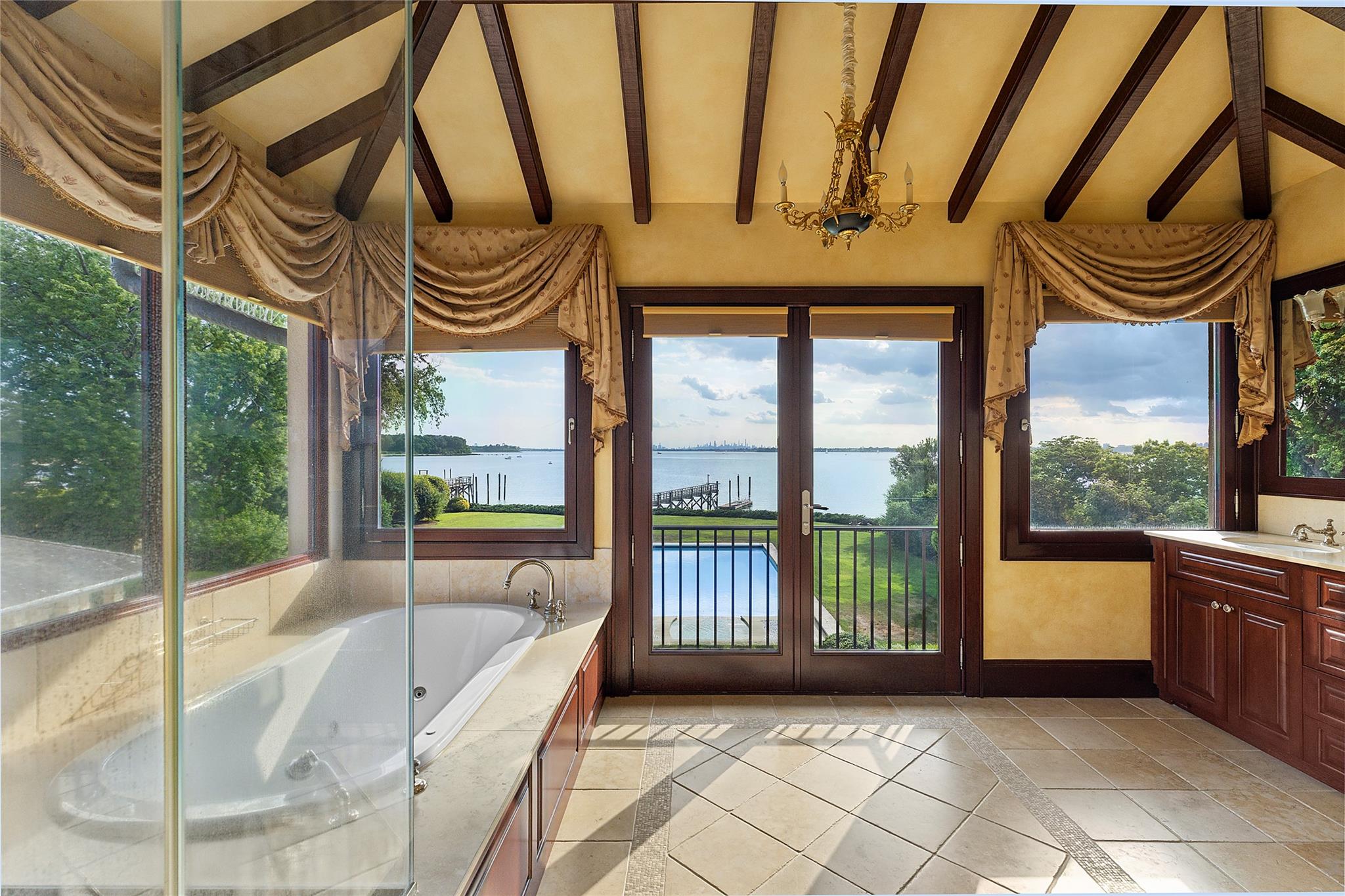 5 Half Moon Lane Sands Point, NY 11050 - Photo 15 of 35 a view of entryway with a tub and glass door