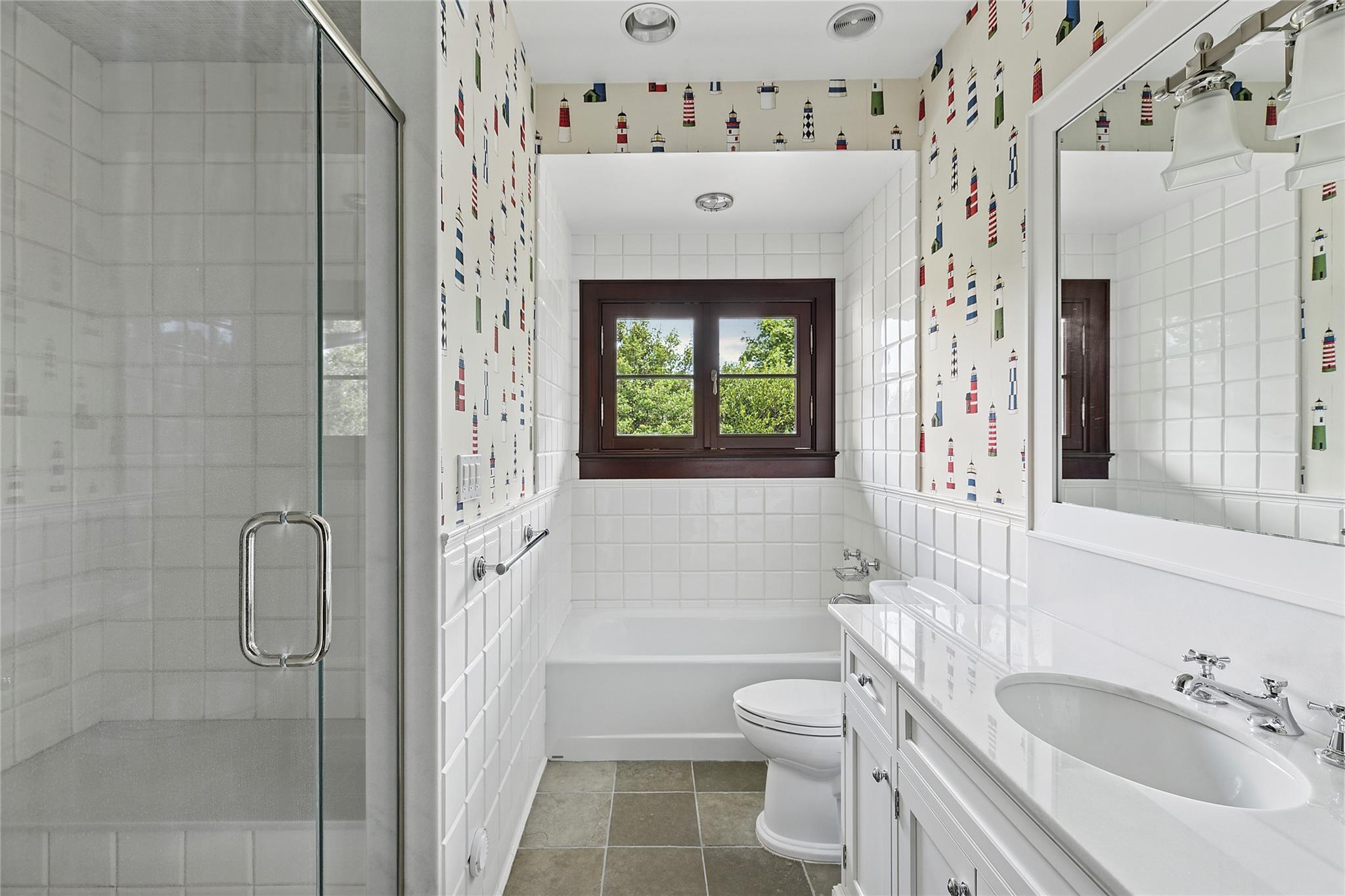 5 Half Moon Lane Sands Point, NY 11050 - Photo 17 of 35 a bathroom with a sink a toilet and shower