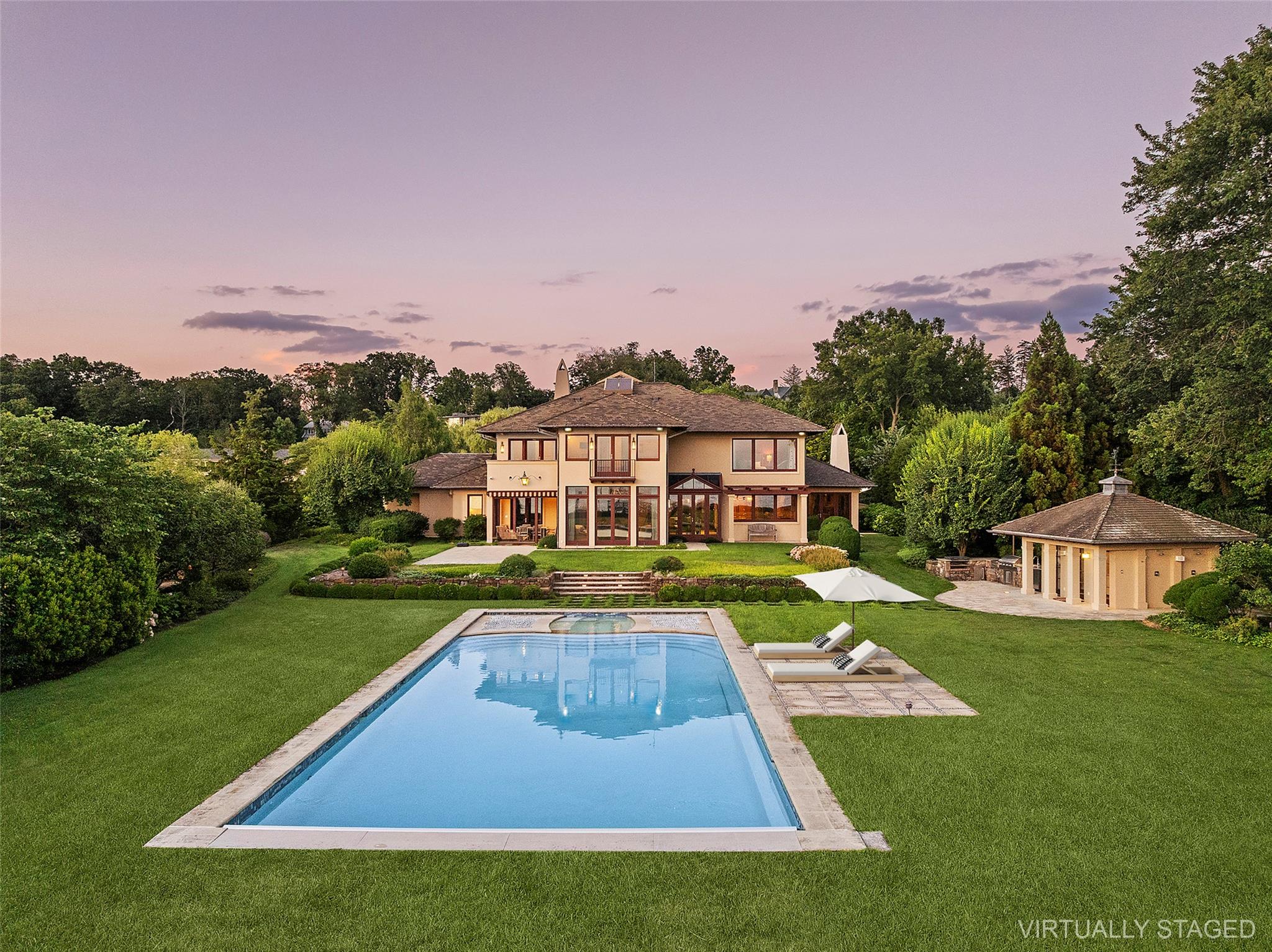 5 Half Moon Lane Sands Point, NY 11050 - Photo 29 of 35 swimming pool with outdoor seating and garden