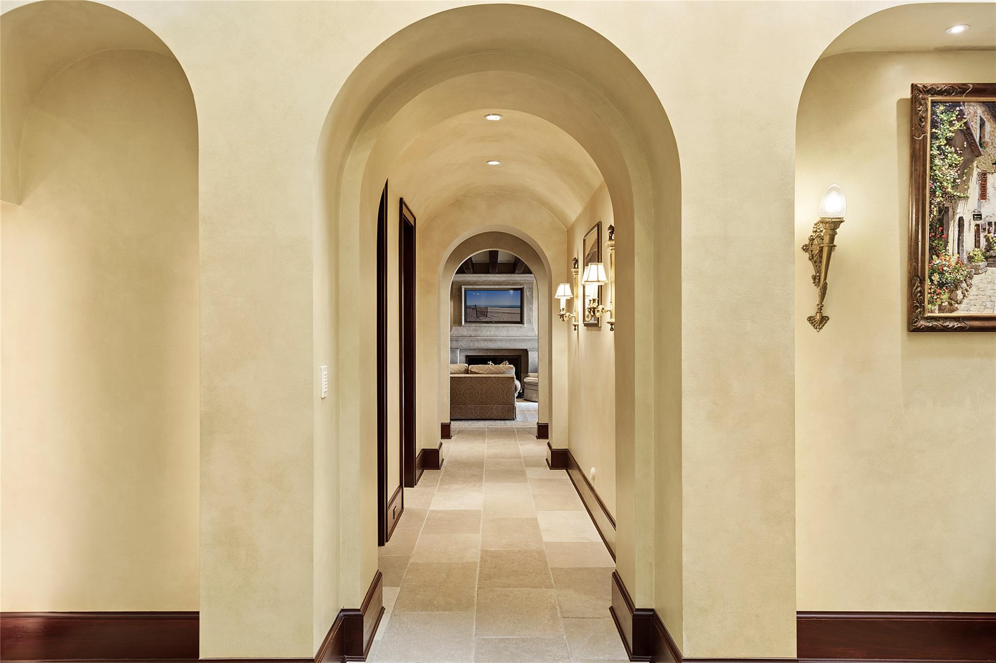 5 Half Moon Lane Sands Point, NY 11050 - Photo 3 of 35 a view of a hallway with wooden floor and a bathroom
