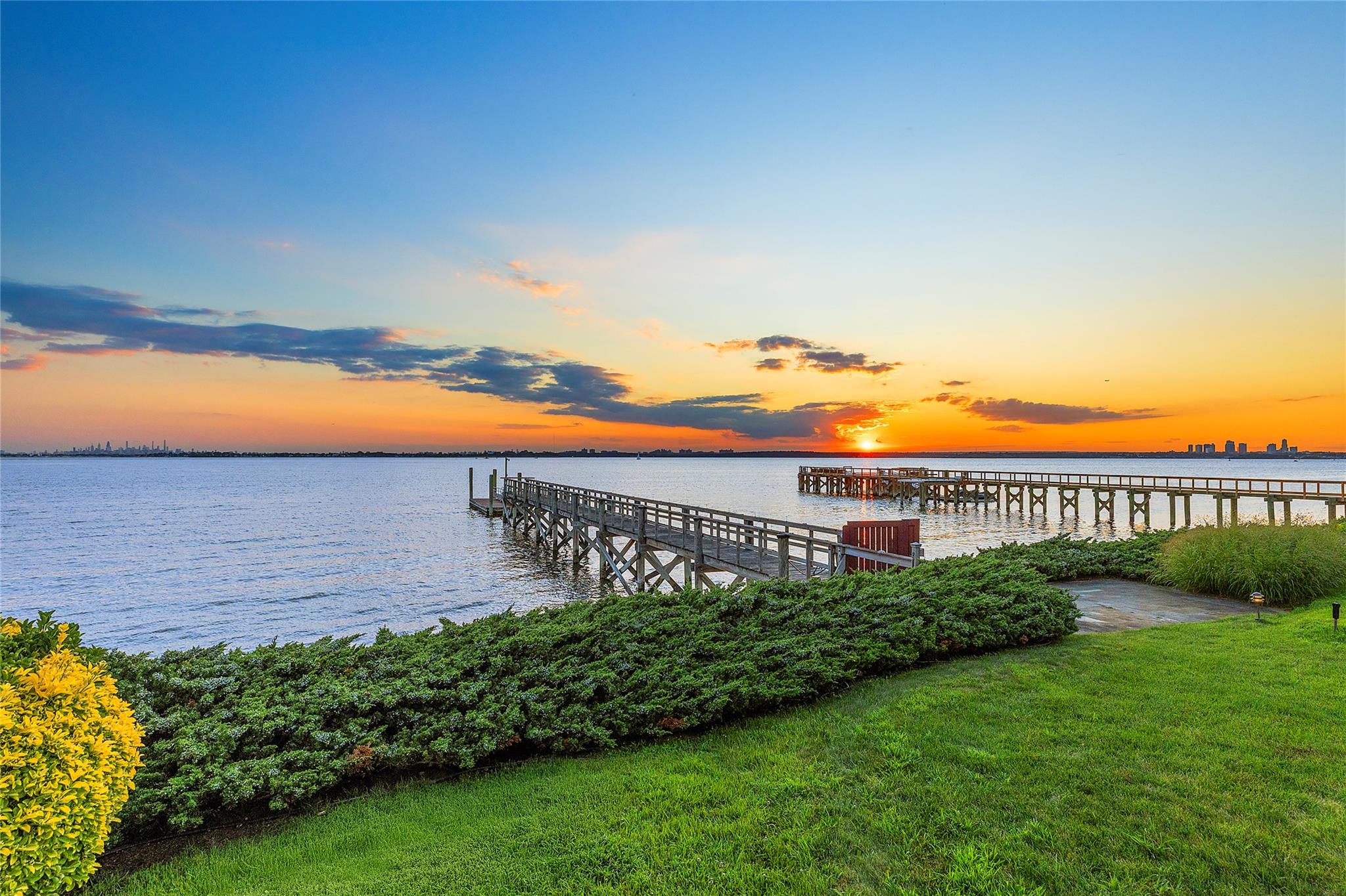 5 Half Moon Lane Sands Point, NY 11050 - Photo 32 of 35 a view of a garden with a building in the background