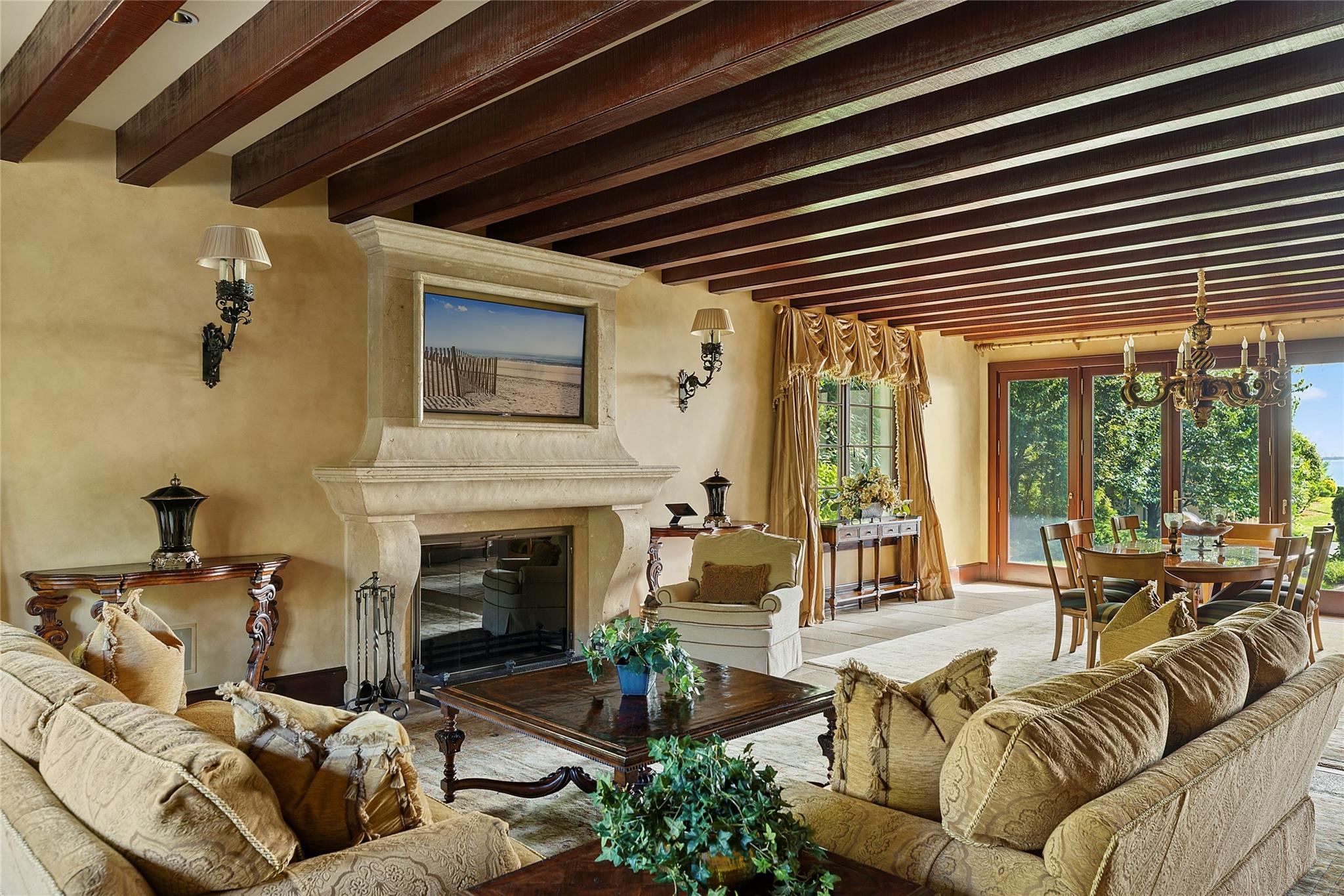 5 Half Moon Lane Sands Point, NY 11050 - Photo 5 of 35 a living room with furniture and a fireplace