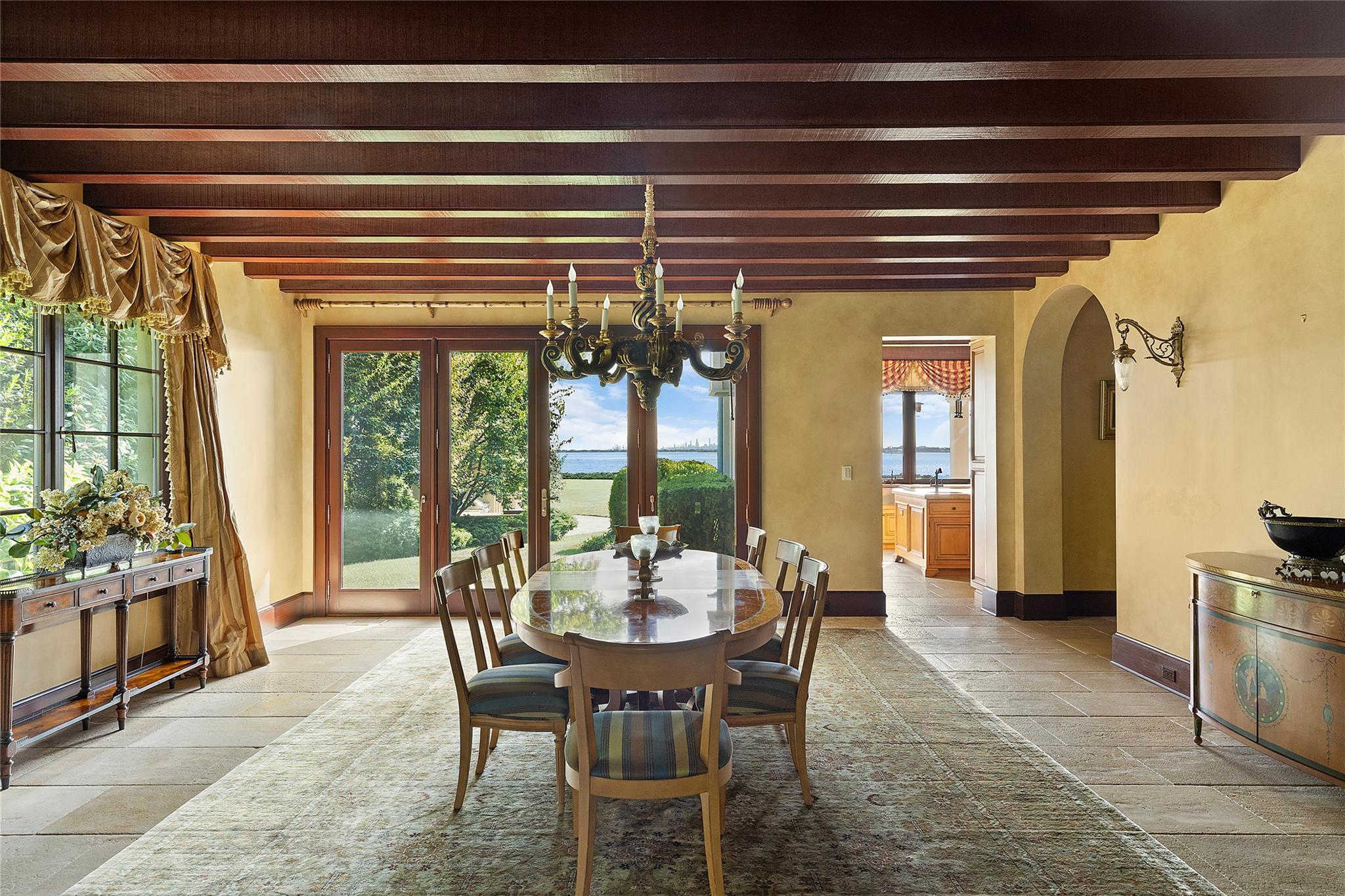 5 Half Moon Lane Sands Point, NY 11050 - Photo 6 of 35 a view of a dining room with furniture window and wooden floor