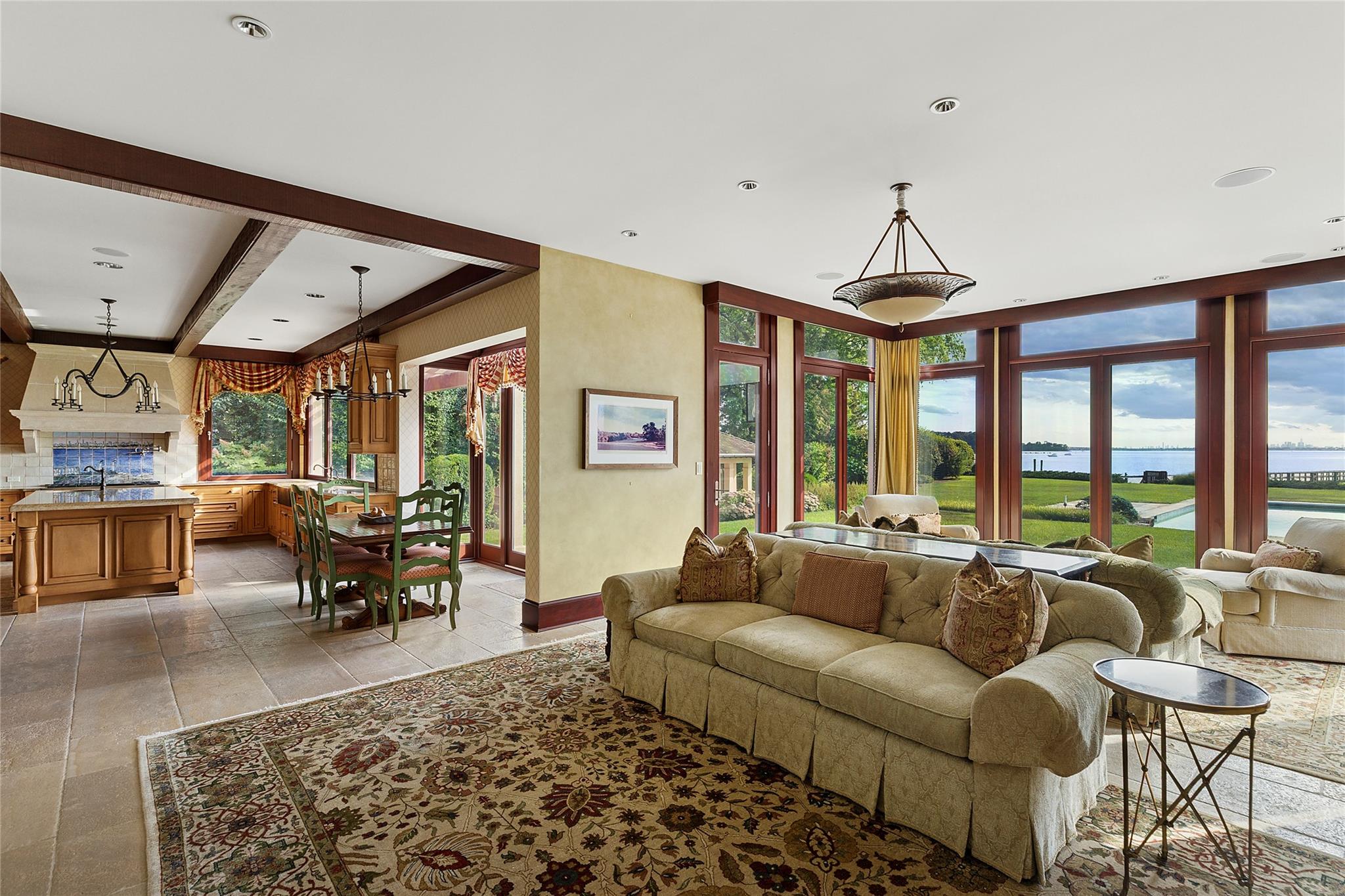 5 Half Moon Lane Sands Point, NY 11050 - Photo 10 of 35 a living room with furniture and a large window