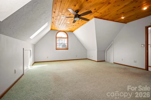 a view of a room with windows