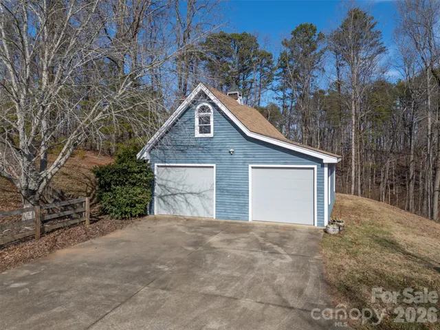 a house with trees in the background
