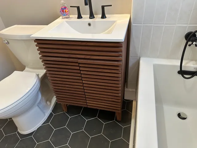 a bathroom with a sink and a toilet