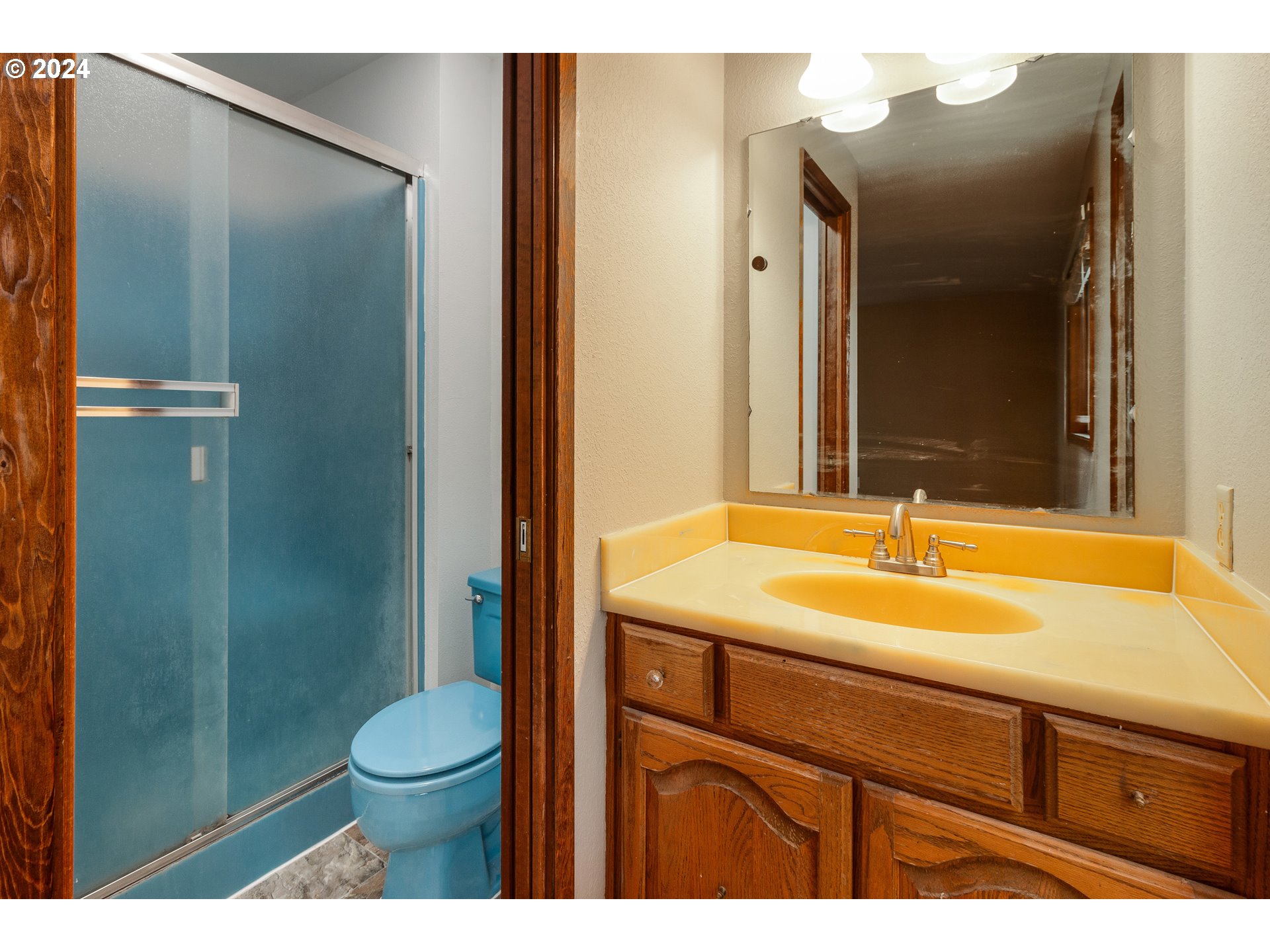 83766 Cloverdale Road Creswell, OR 97426 - Photo 24 of 45 a bathroom with a sink a toilet and shower