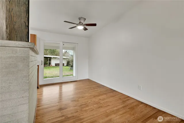 a view of an empty room and window